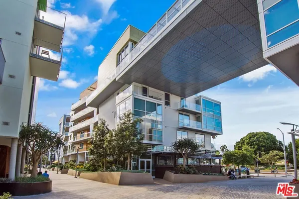 a front view of a building with street view