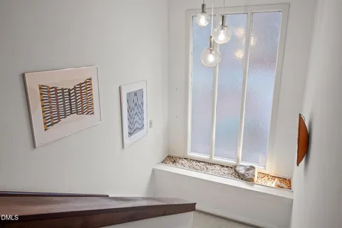 a view of livingroom with furniture and stairs