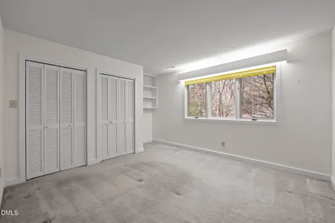 a view of a backyard of the house