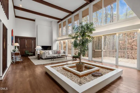 a living room with furniture and a table