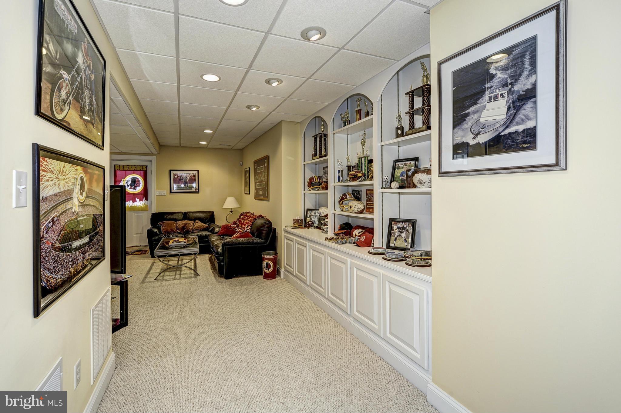 14105 Howard Road Dayton, MD 21036 - Photo 22 of 30 Lower Level Custom Built in Cabs/Recessed Lighting