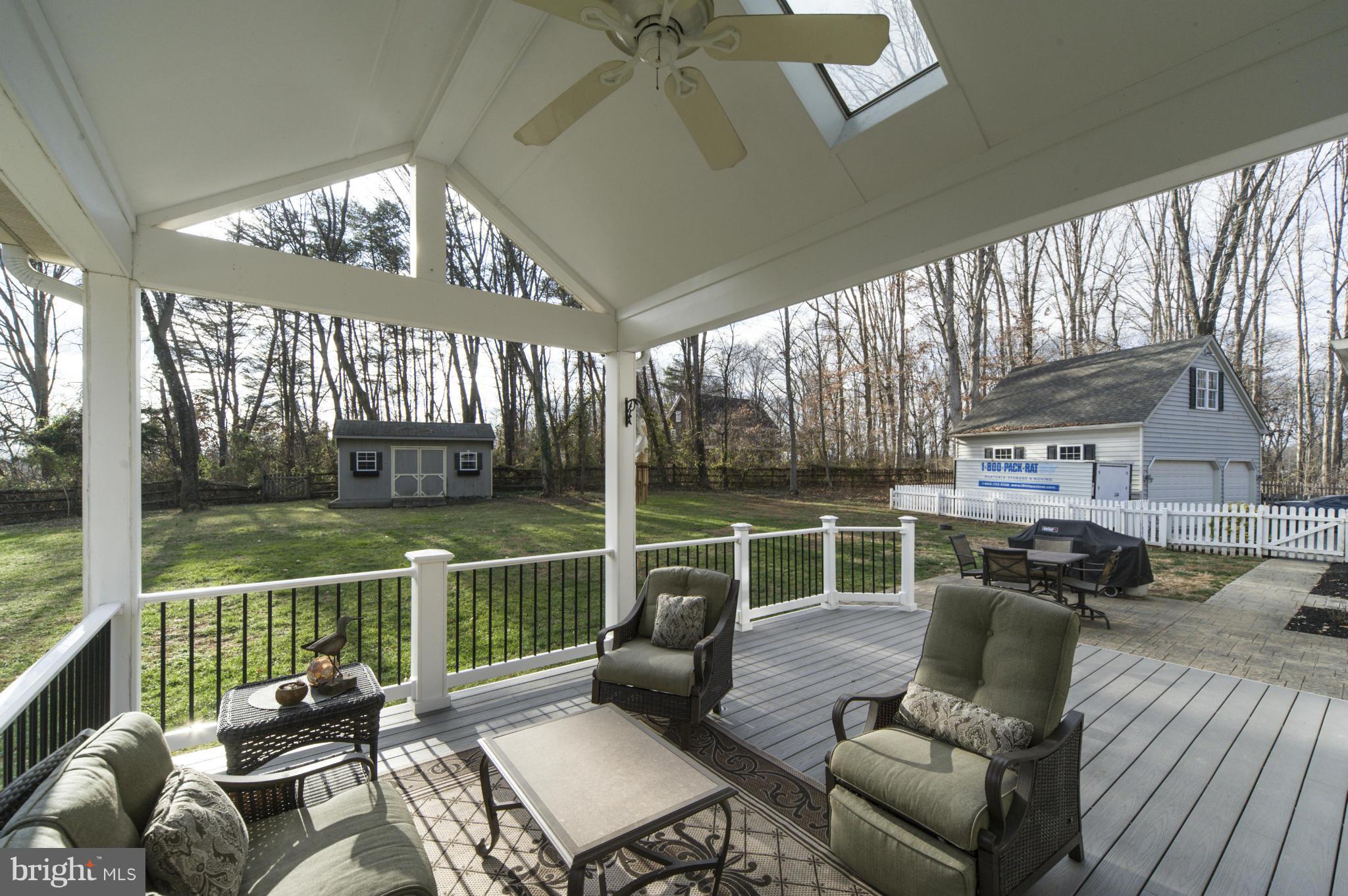 14105 Howard Road Dayton, MD 21036 - Photo 28 of 30 Porch w/skylights/ceiling fan,concrete patio