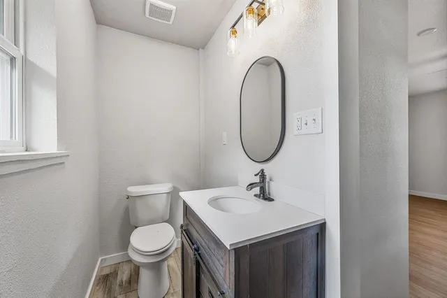 a bathroom with a sink and a toilet