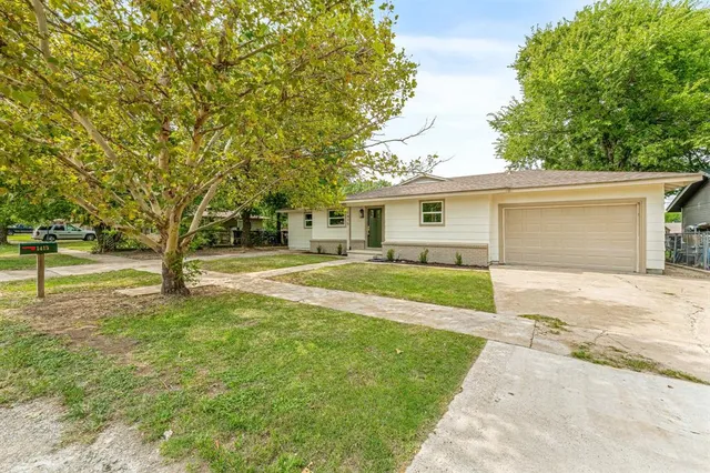 a front view of house with yard