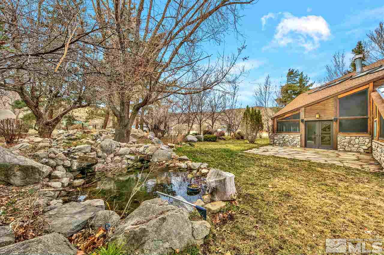 239 Theobald Reno, NV 89521 - Photo 3 of 23 a view of backyard of the house