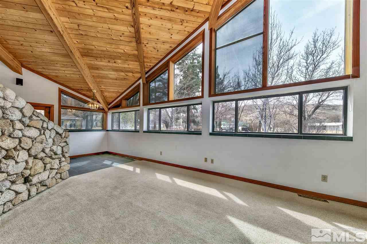 239 Theobald Reno, NV 89521 - Photo 5 of 23 a view of an empty room with a window