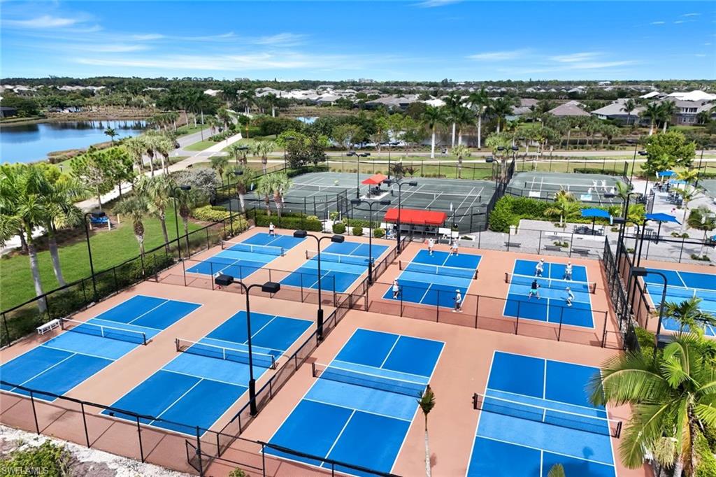 4905 Andros Drive Naples, FL 34113 - Photo 26 of 45 Aerial view of Pickleball and Tennis Courts