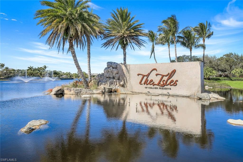 4905 Andros Drive Naples, FL 34113 - Photo 27 of 45 Community sign featuring a water view