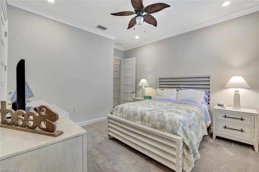 4905 Andros Drive Naples, FL 34113 - Photo 30 of 45 Bedroom featuring recessed lighting, crown molding, light colored carpet, and a ceiling fan