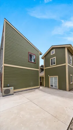 a front view of a house with garage