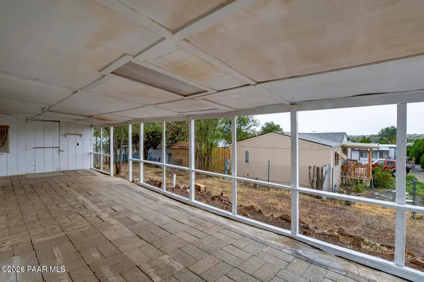 a kitchen with stainless steel appliances a stove a sink dishwasher and cabinets with wooden floor