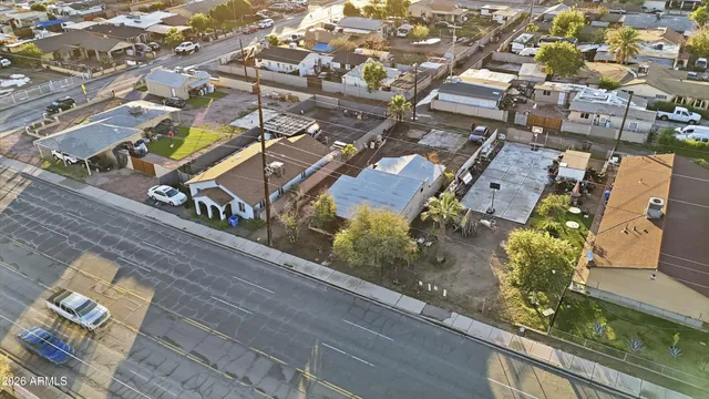 an aerial view of residential house with outdoor space