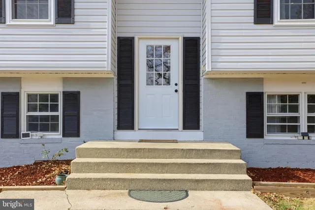 a front view of a house with windows