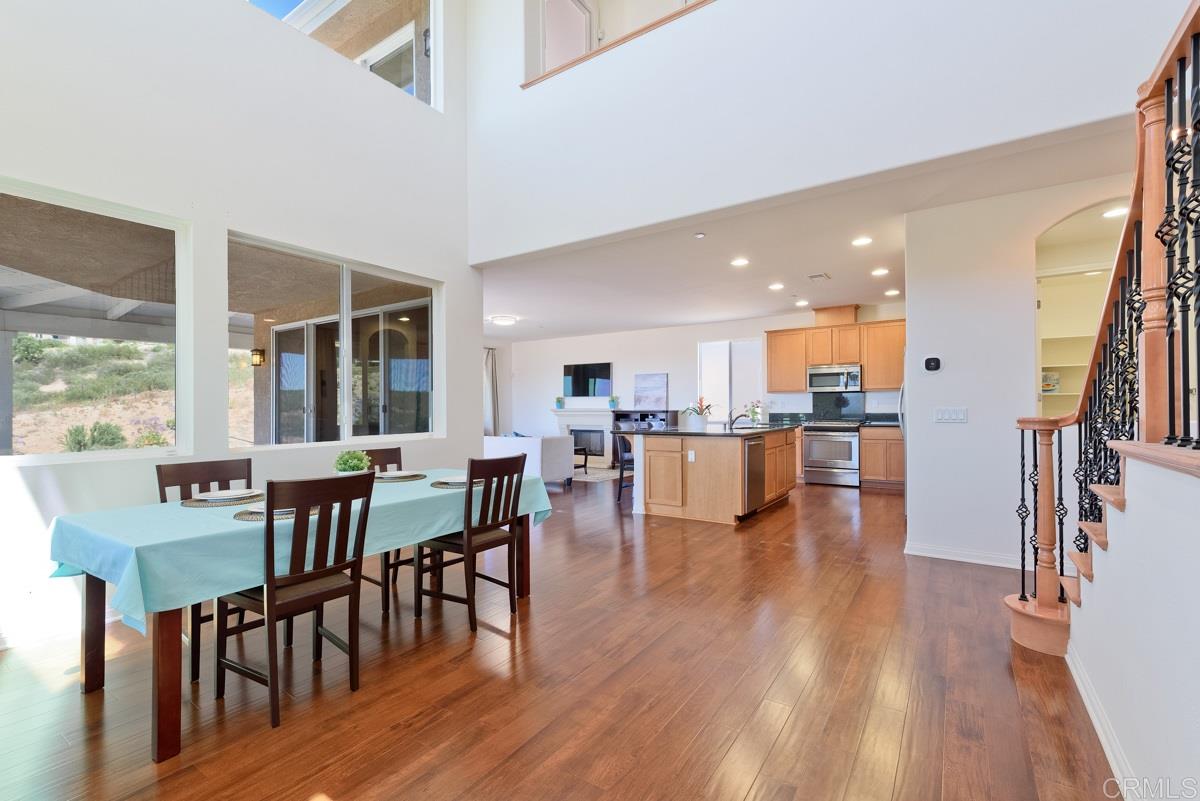 23005 Stokes Road Ramona, CA 92065 - Photo 25 of 25 Entry into open floor plan, 20 ft height ceiling and large-scale windows.