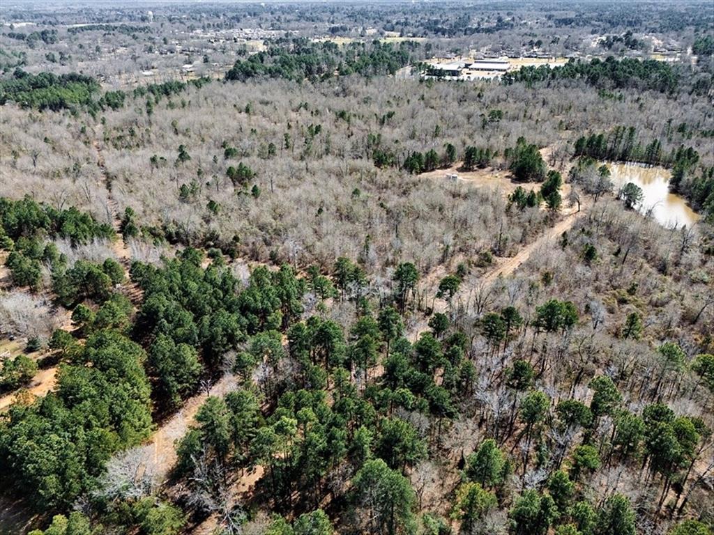 1 East George Richey Road Longview, TX 75604 - Photo 2 of 25 an aerial view of house with yard and mountain view