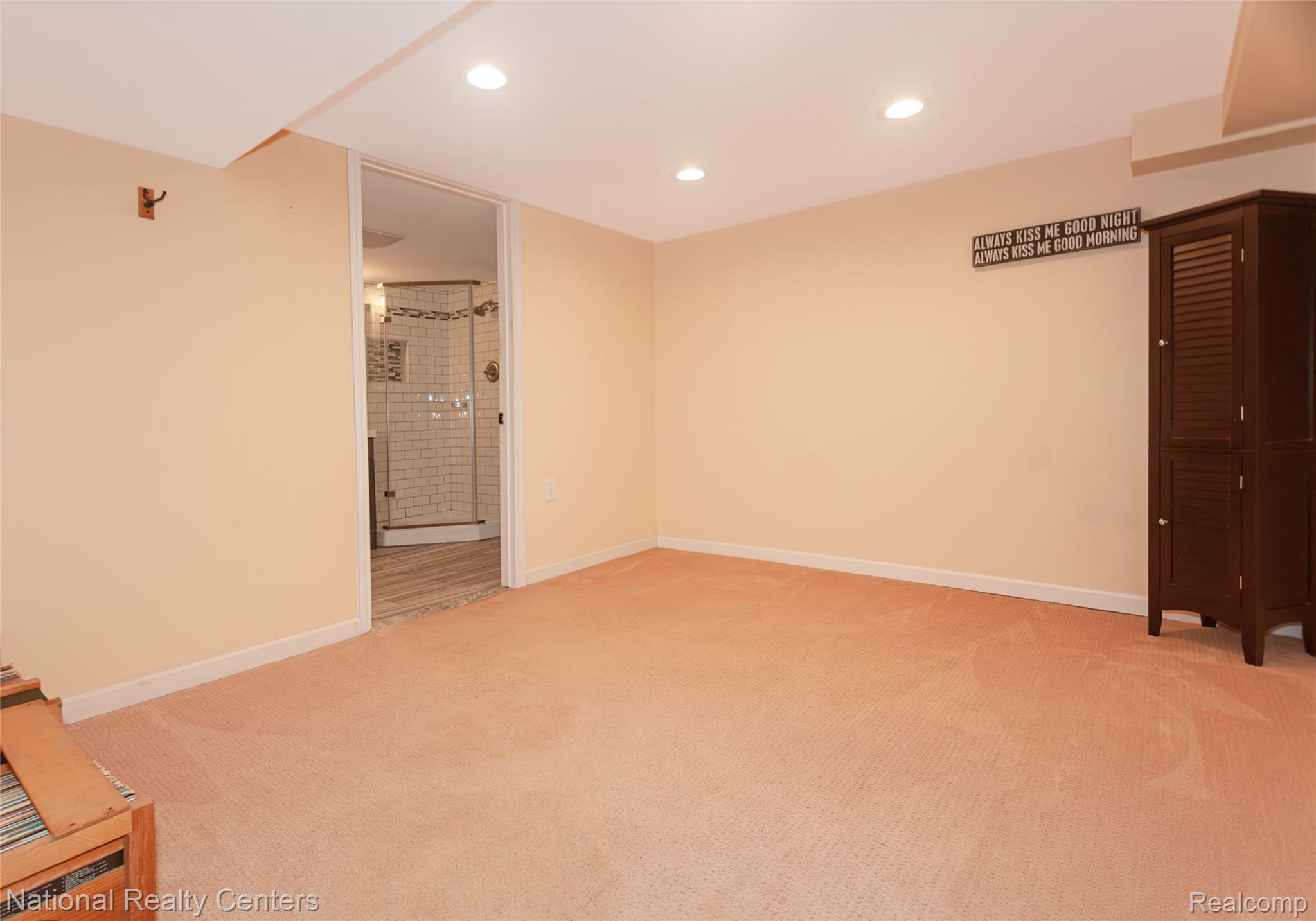 2446 Milverton Road Troy, MI 48083 - Photo 30 of 41 Unfurnished bedroom with light colored carpet, recessed lighting, and ensuite bathroom