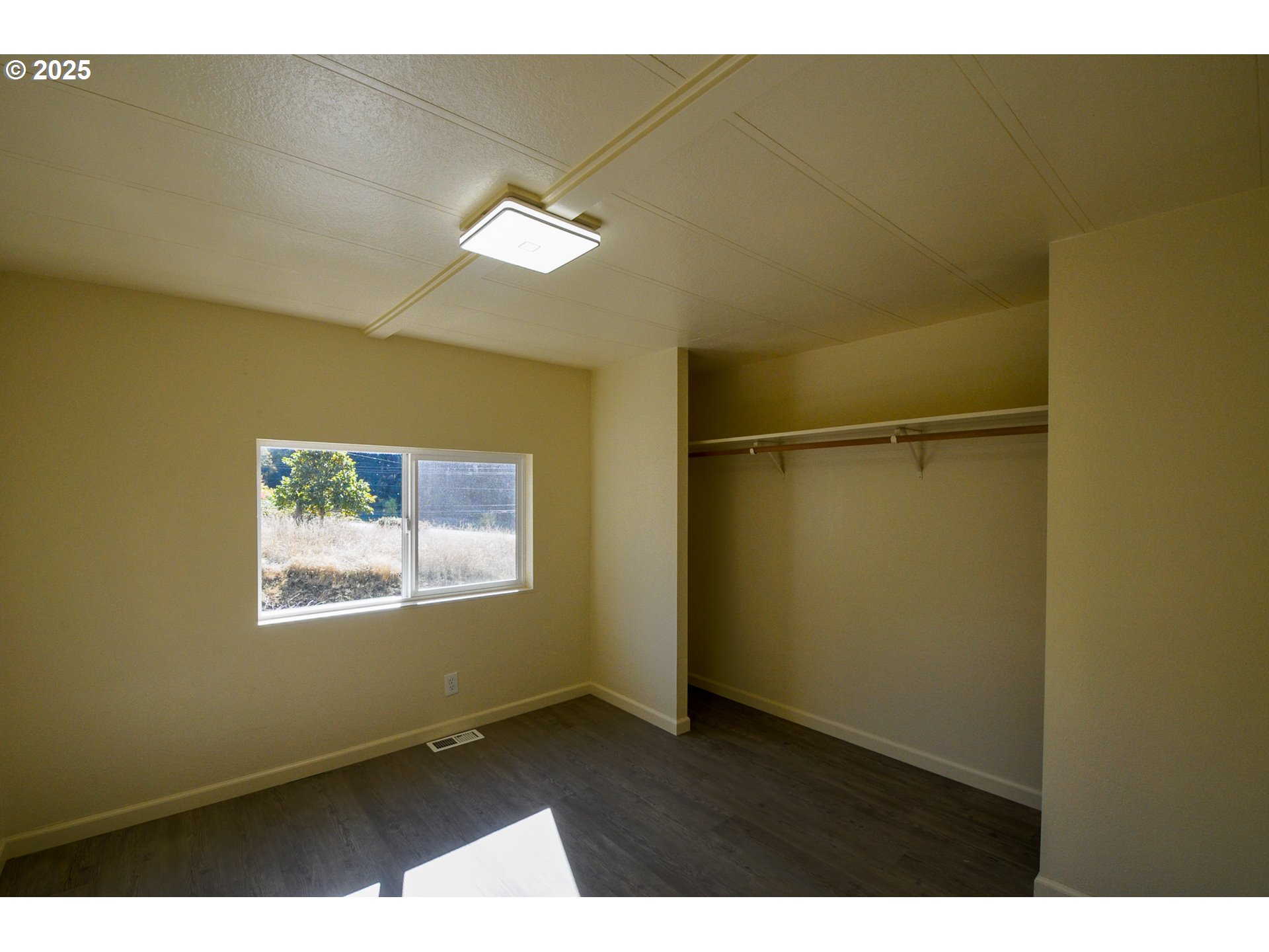 2193 Canyonville-Riddle Road Riddle, OR 97469 - Photo 15 of 25 a view of an empty room with a window