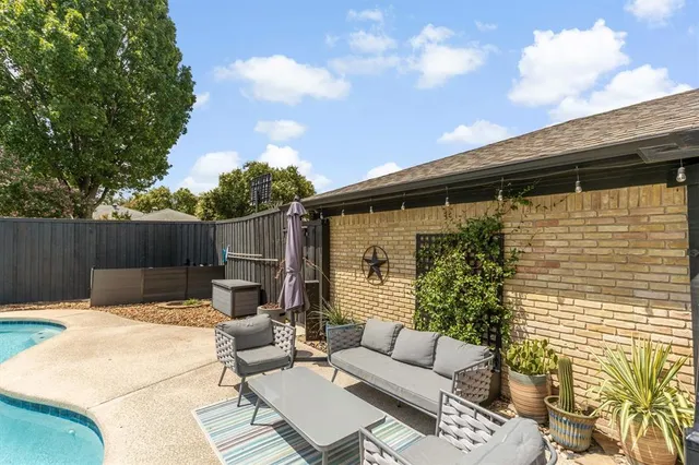 a backyard of a house with seating space