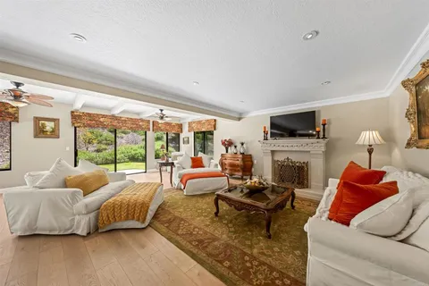 a bedroom with a bed and a fireplace