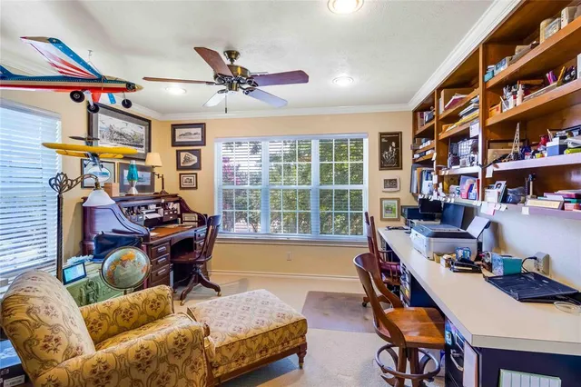 a bedroom with bed and wooden floor