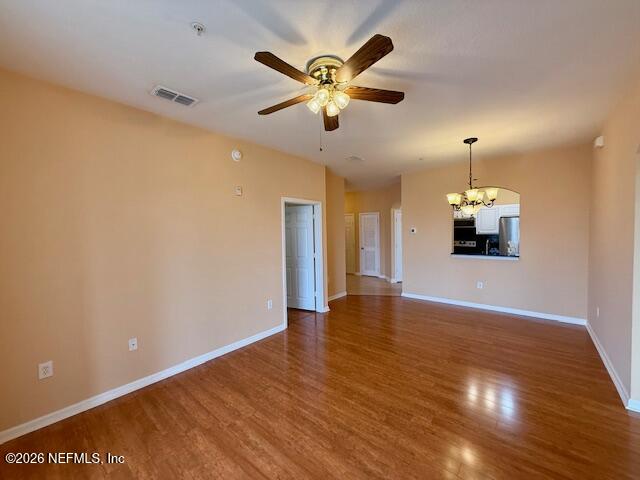 7990 Baymeadows Road East, Unit 928 Jacksonville, FL 32256 - Photo 11 of 30 a view of a livingroom with a ceiling fan wooden floor and a ceiling fan