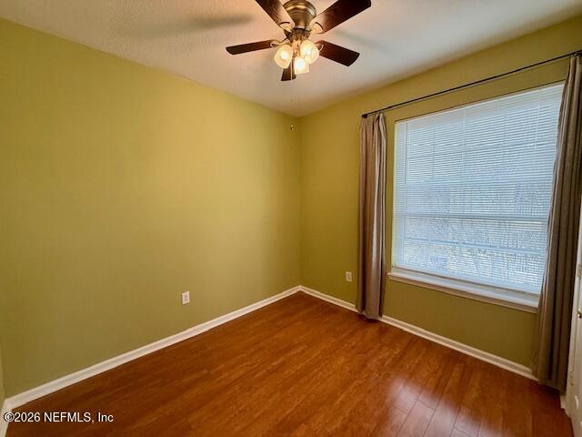 7990 Baymeadows Road East, Unit 928 Jacksonville, FL 32256 - Photo 20 of 30 a view of room with window and wooden floor