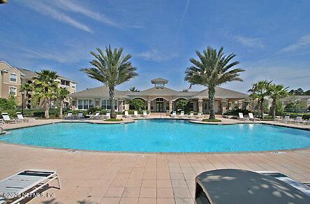 7990 Baymeadows Road East, Unit 928 Jacksonville, FL 32256 - Photo 25 of 30 a view of swimming pool and lake view
