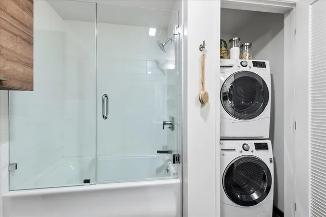 a view of a bathroom with a sink and a shower