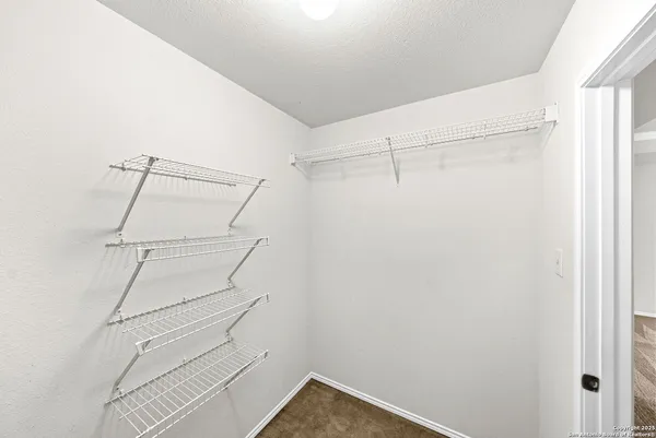 a view of a backyard with a garden