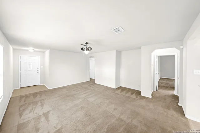 an empty room with windows