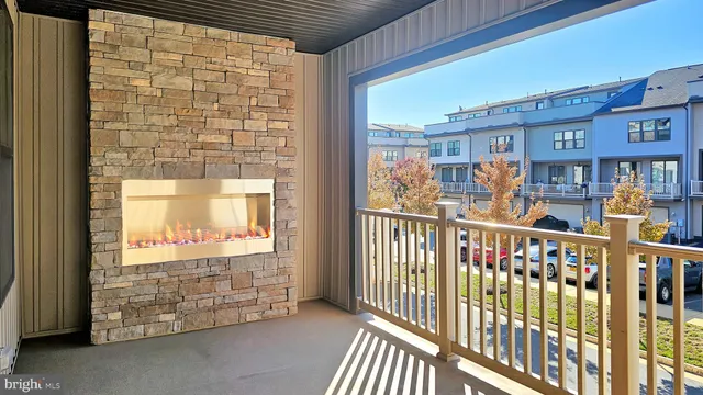 a view of a porch with wooden floor