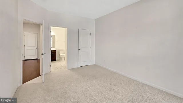 a view of a big room with closet and cabinet