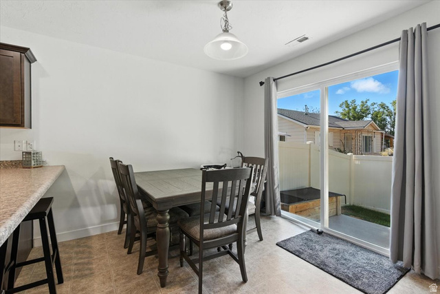 1187 Seraphim Court Layton, UT 84041 - Photo 4 of 18 Dining area featuring baseboards
