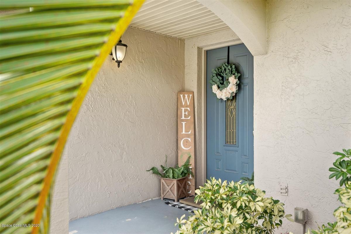 108 Neptune Court Indialantic, FL 32903 - Photo 2 of 33 a view of a front door and wooden floor