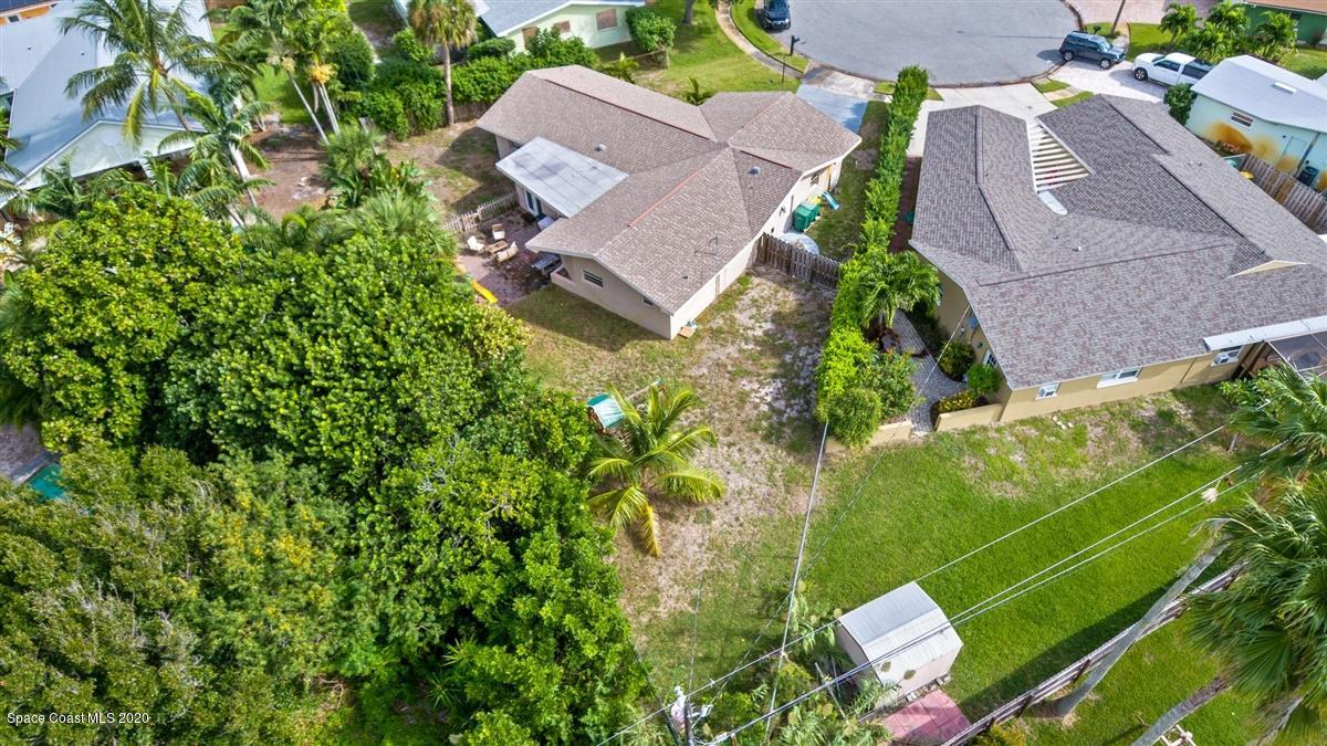 108 Neptune Court Indialantic, FL 32903 - Photo 11 of 33 an aerial view of a house with a yard
