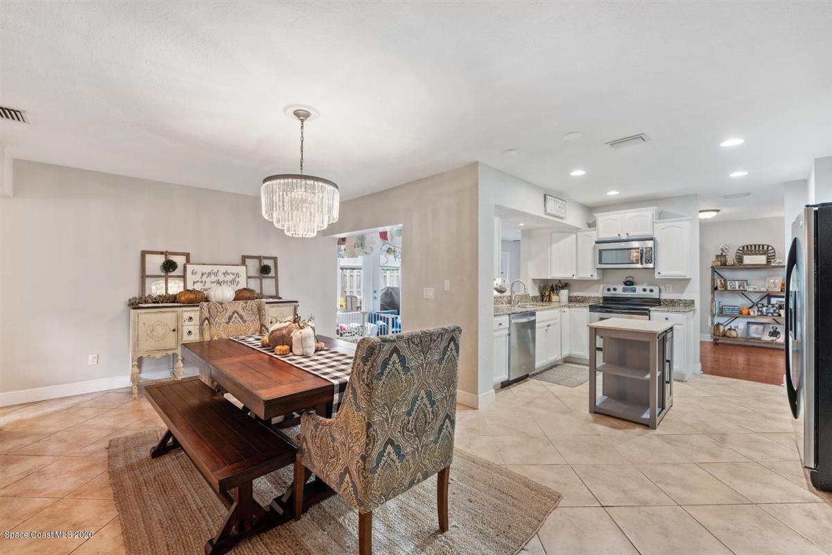 108 Neptune Court Indialantic, FL 32903 - Photo 20 of 33 a view of a dining room kitchen and a window