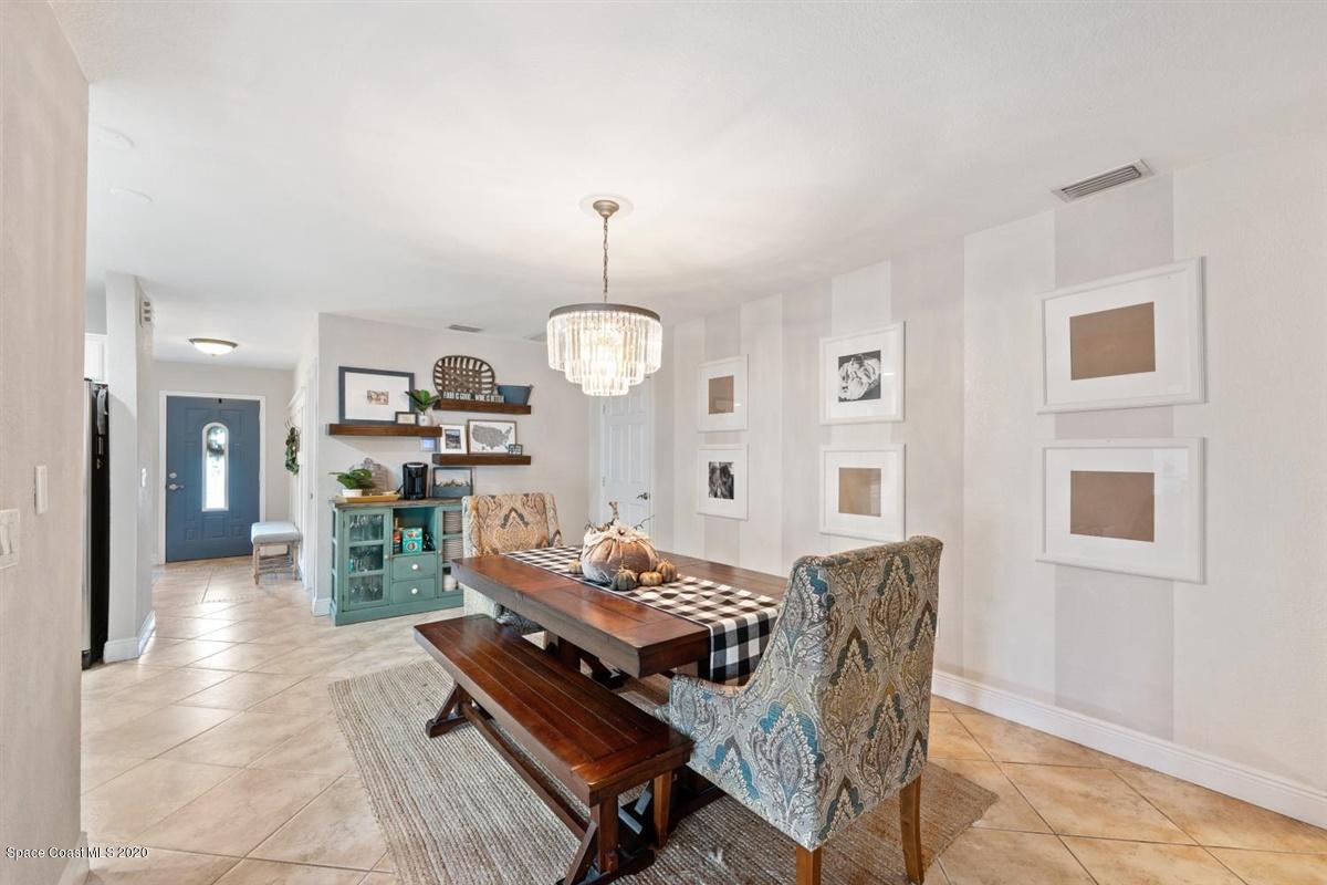 108 Neptune Court Indialantic, FL 32903 - Photo 21 of 33 a view of a dining room with furniture
