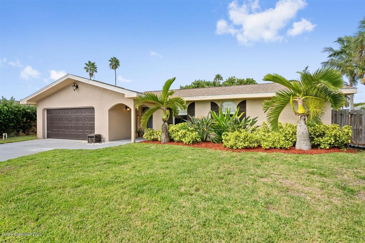 108 Neptune Court Indialantic, FL 32903 - Photo 5 of 33 a view of a house with a backyard