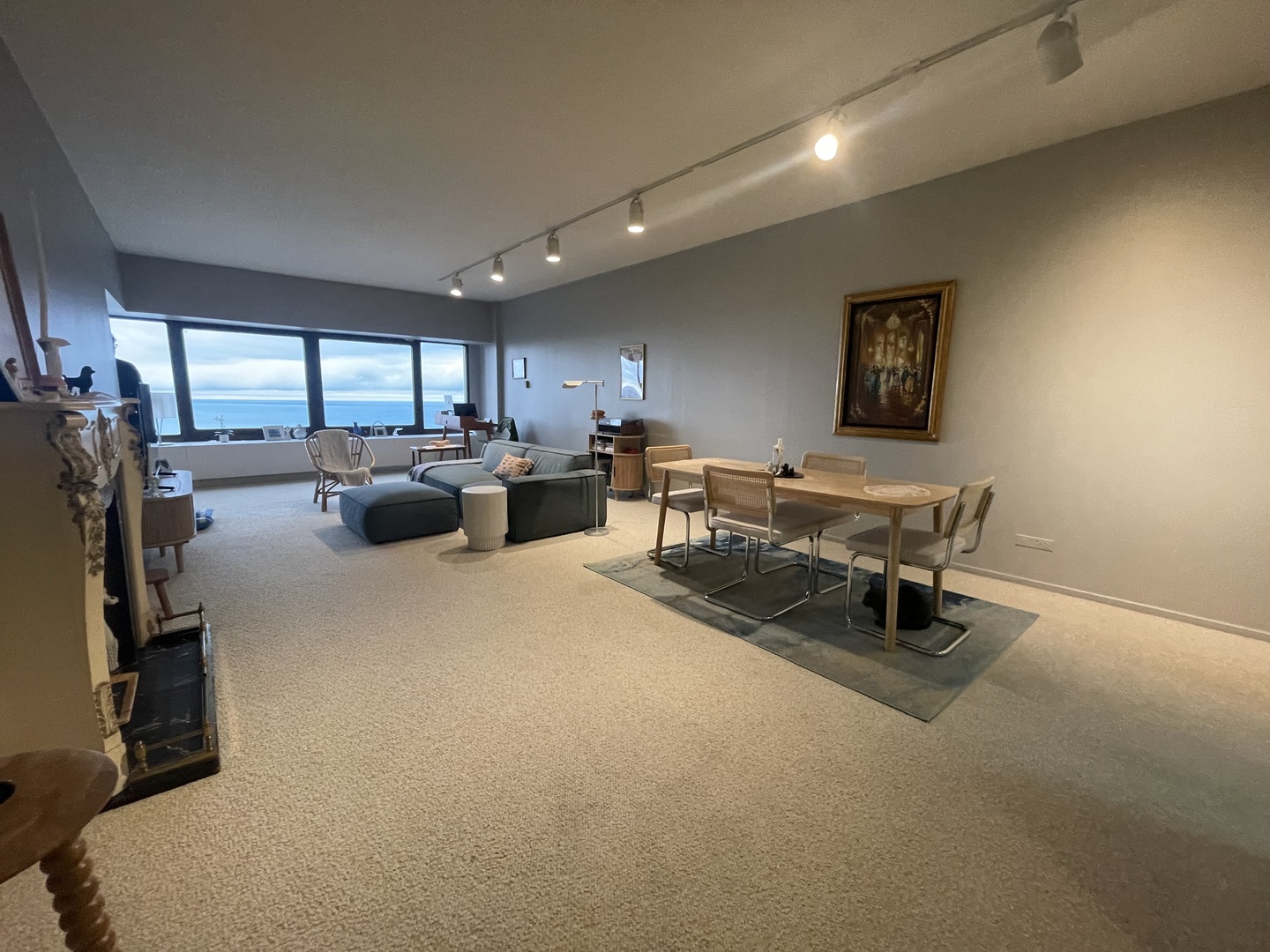 175 East Delaware Place, Unit 4503 Chicago, IL 60611 - Photo 4 of 26 a living room with furniture a window and gym equipment