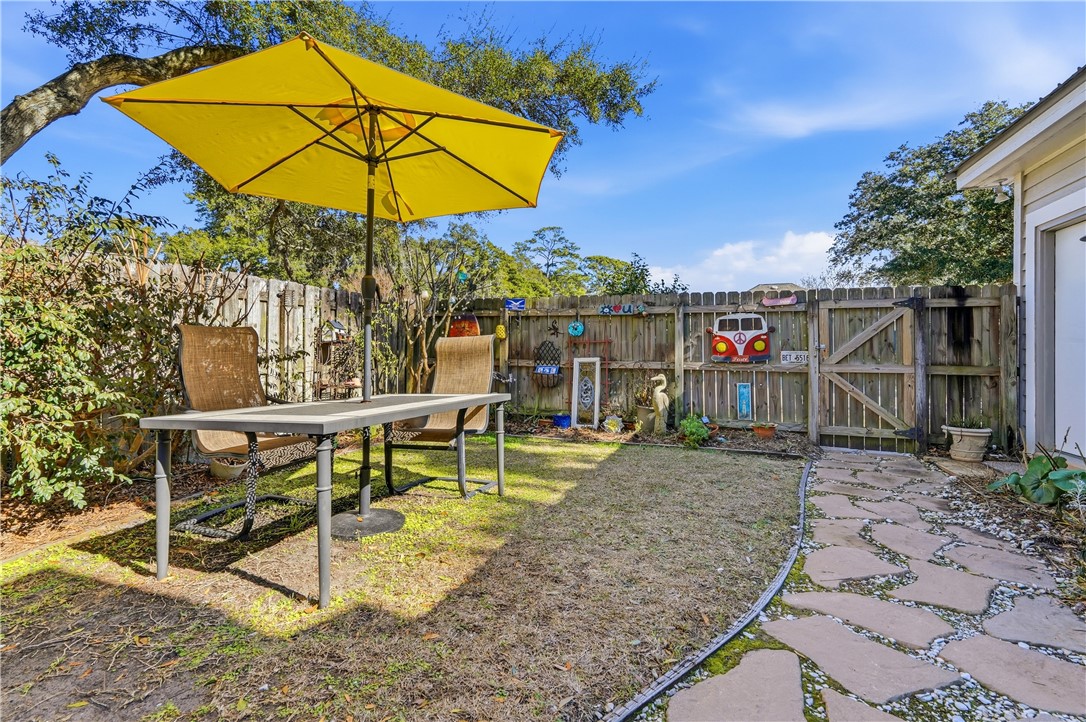 323 Sand Castle Lane St. Simons Island, GA 31522 - Photo 34 of 41 Backyard view from screened porch