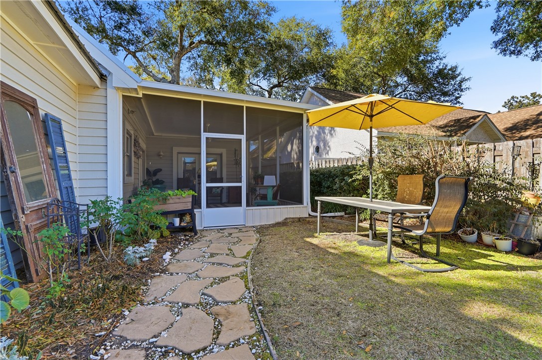 323 Sand Castle Lane St. Simons Island, GA 31522 - Photo 35 of 41 Backyard from gate towards screened porch