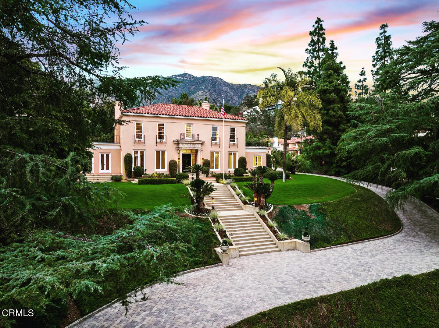 625 Cumberland Road Glendale, CA 91202 - Photo 1 of 73 a view of a white house with a big yard plants and large trees