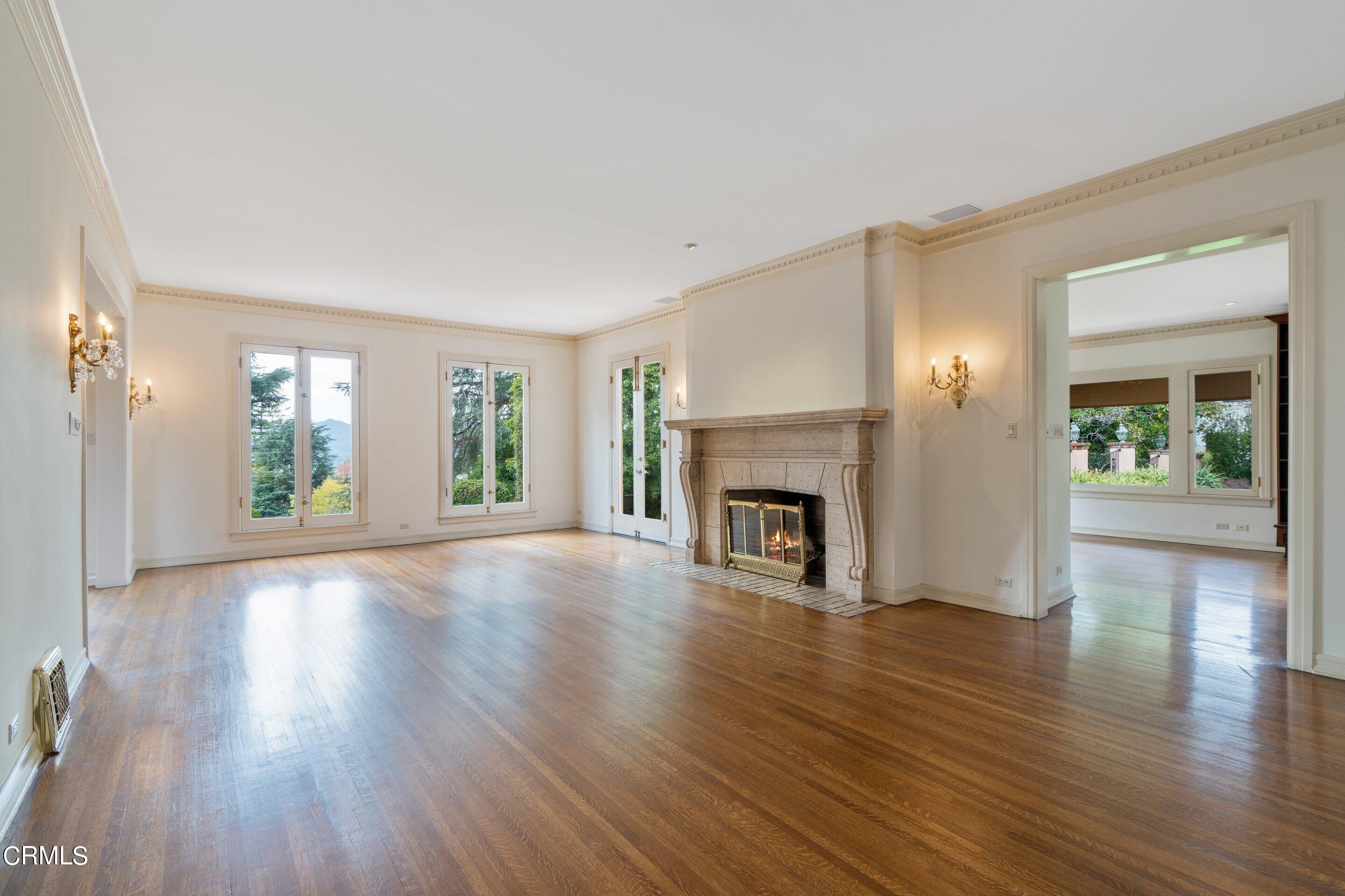 625 Cumberland Road Glendale, CA 91202 - Photo 28 of 73 a view of an empty room with wooden floor and a window