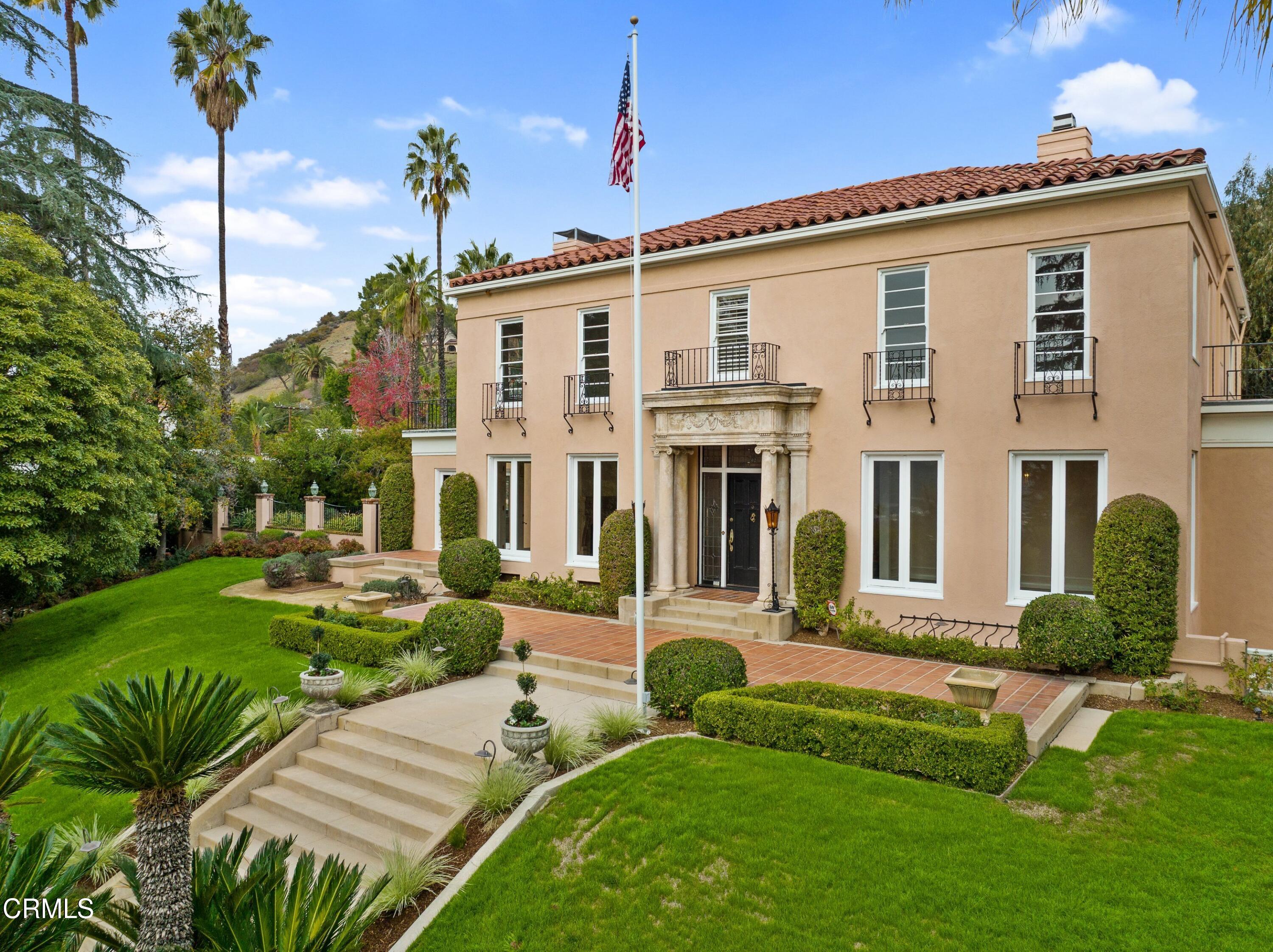 625 Cumberland Road Glendale, CA 91202 - Photo 3 of 73 a front view of a house with a yard