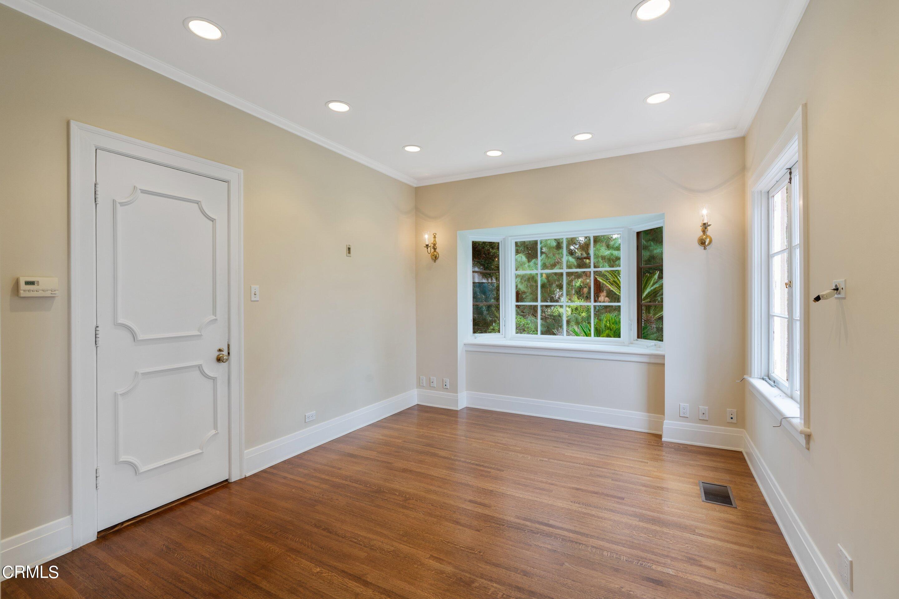 625 Cumberland Road Glendale, CA 91202 - Photo 32 of 73 a view of empty room with wooden floor and fan