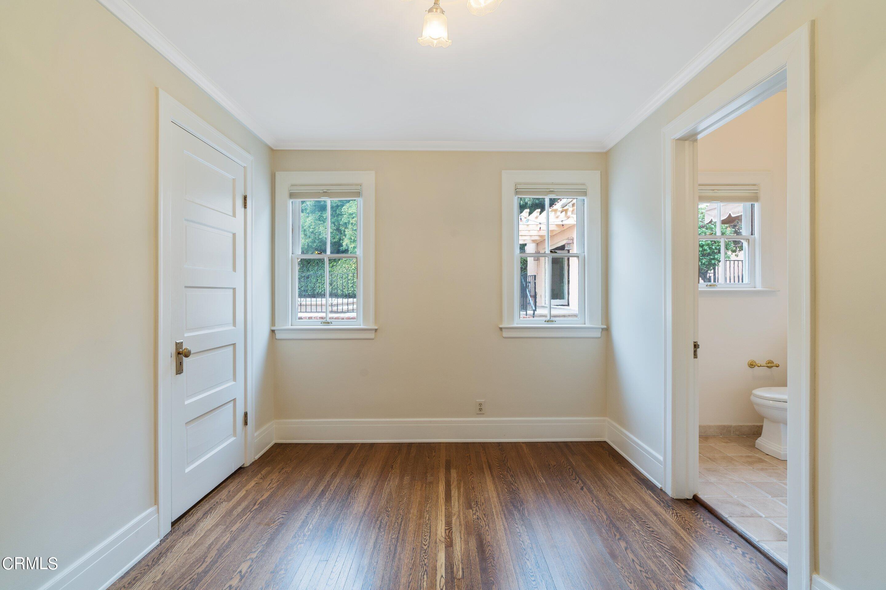 625 Cumberland Road Glendale, CA 91202 - Photo 44 of 73 a view of room with window and hardwood floor