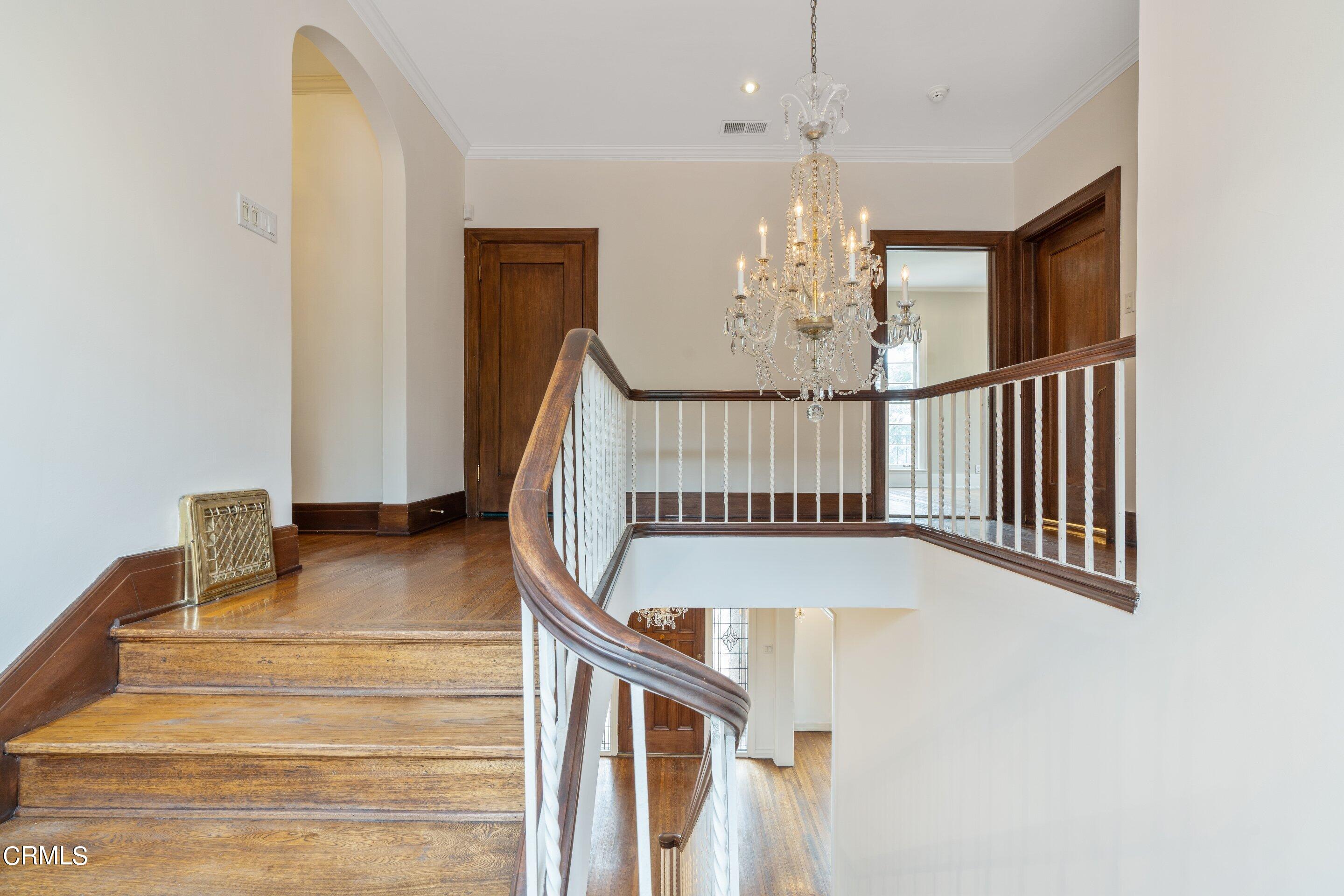 625 Cumberland Road Glendale, CA 91202 - Photo 48 of 73 a view of entryway dining room and hall with a chandelier
