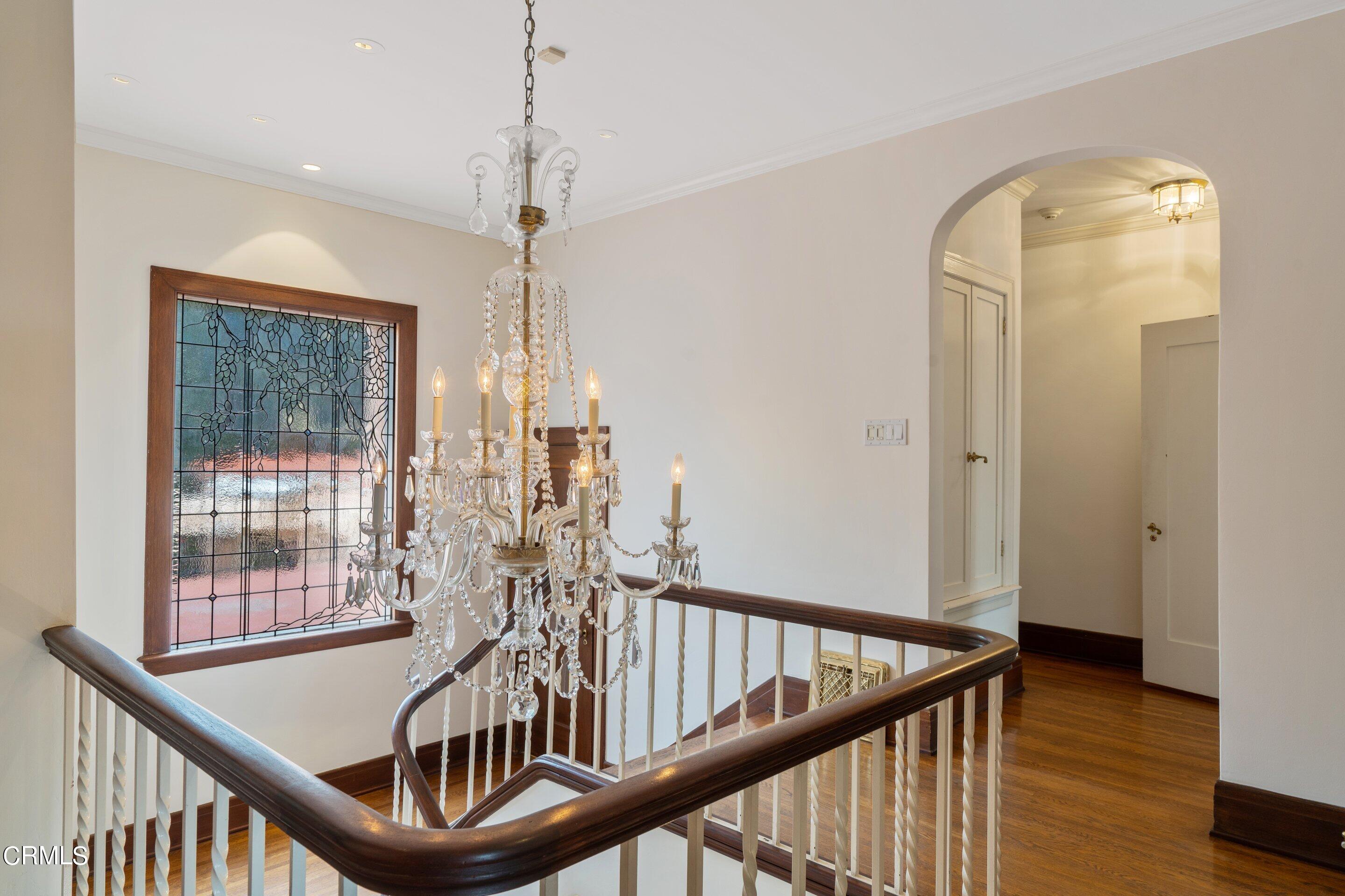 625 Cumberland Road Glendale, CA 91202 - Photo 51 of 73 a view of a hallway with wooden floor and entryway