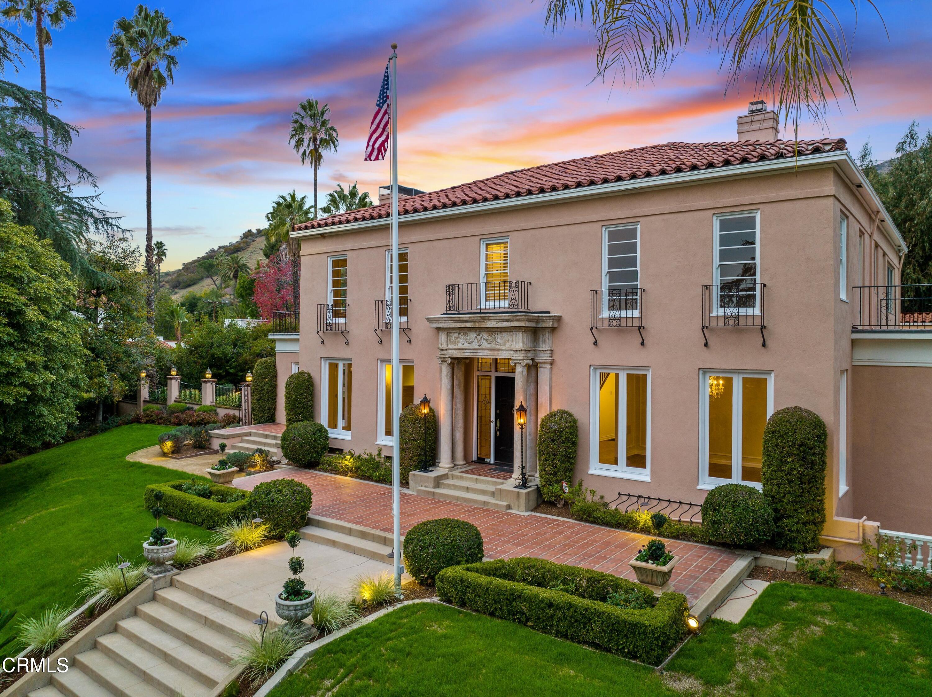 625 Cumberland Road Glendale, CA 91202 - Photo 57 of 73 a front view of a house with garden and trees