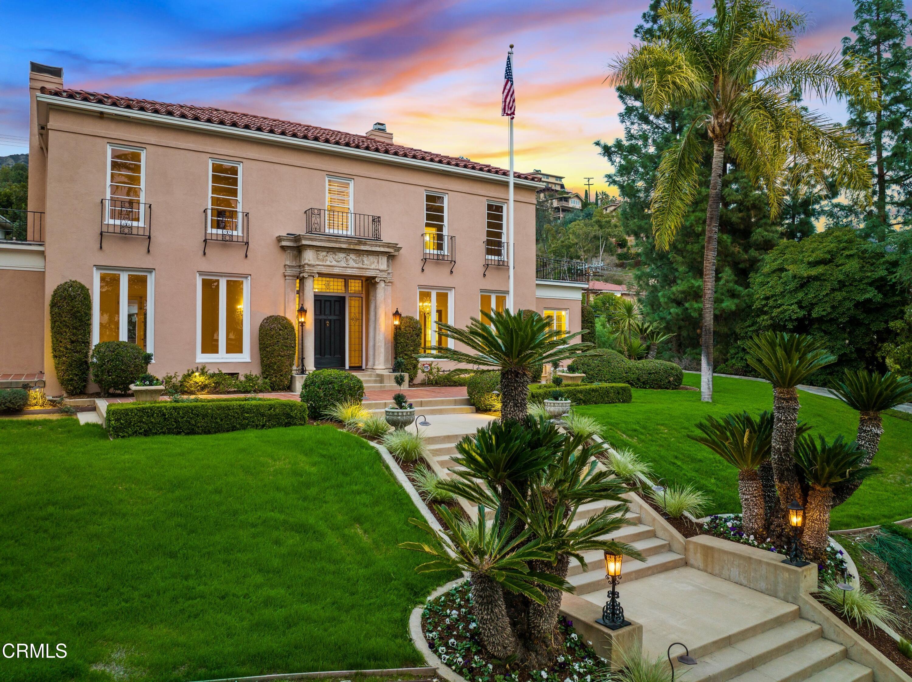 625 Cumberland Road Glendale, CA 91202 - Photo 64 of 73 a front view of a house with a yard table and chairs